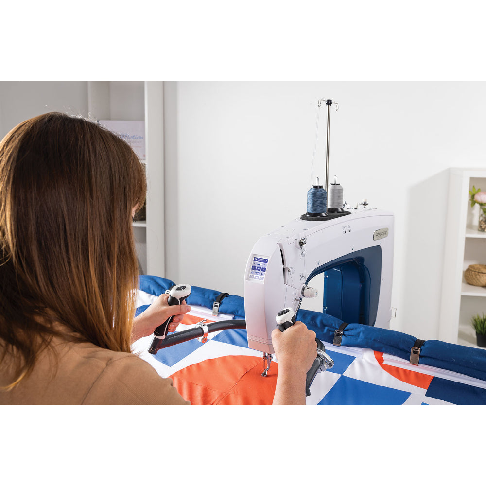 Grace Q'nique 16X Longarm Quilting Machine in use over shoulder